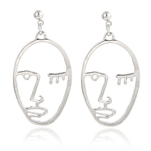 Abstract Stylish Hollow Out Face Dangle Earrings