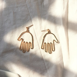 Abstract Stylish Hollow Out Face Dangle Earrings